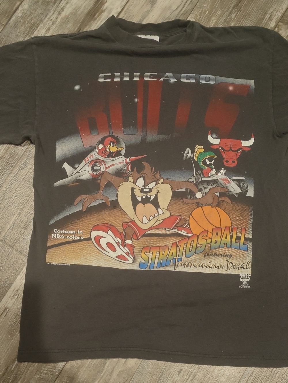Warner Bros. Black Tee with Gold Basketball Graphic